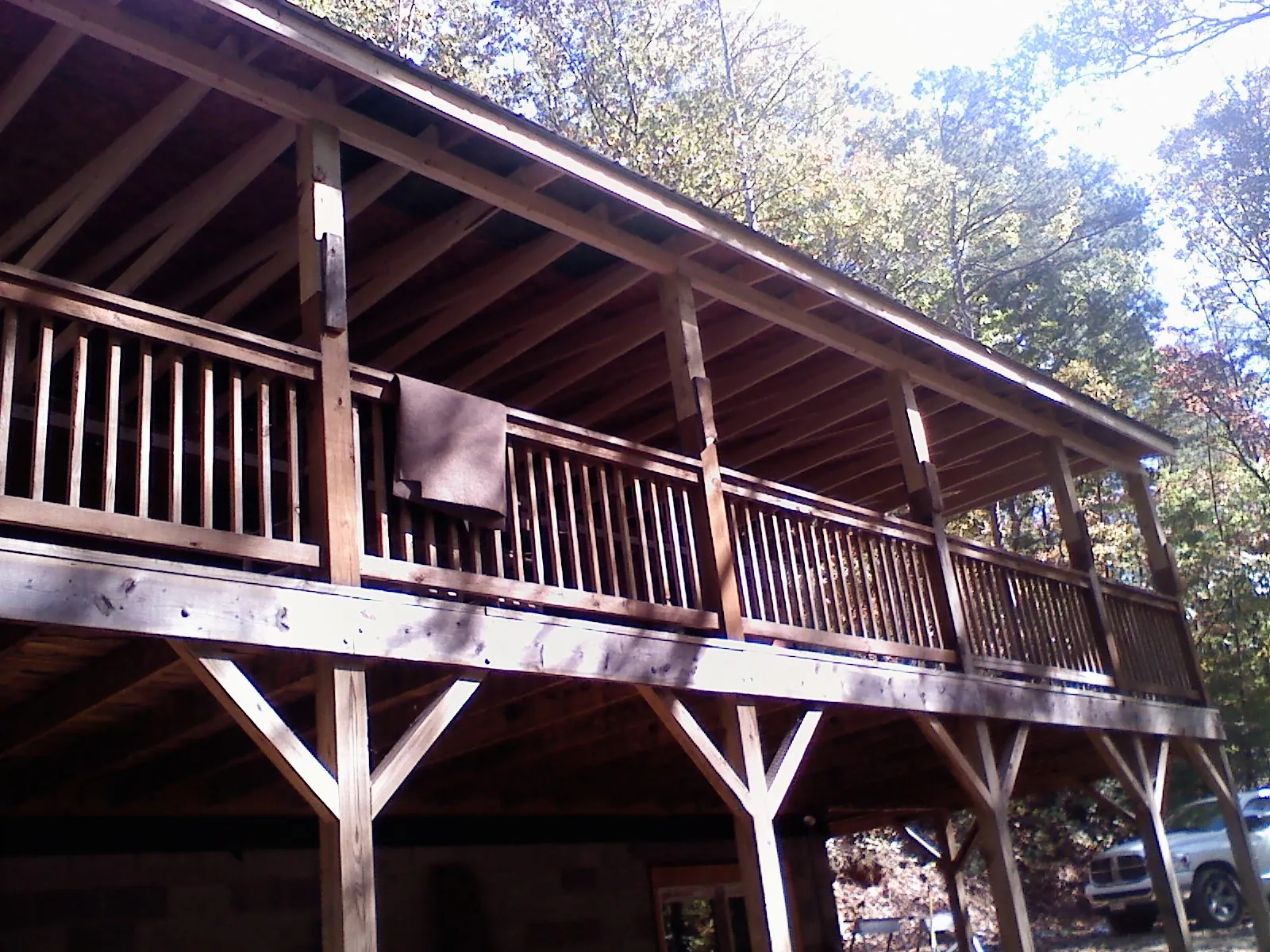 Timber framing under a new elevated porch and deck — Roof Leak Repair in Maricopa by Roofing Brothers